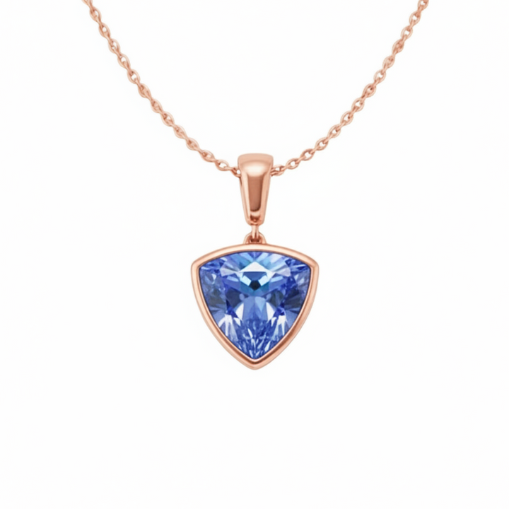 Trillion cut light blue sapphire necklace in 14K rose gold, Ceylon blue sapphire bezel pendant | Rare Earth Jewelry