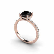 Unique black stone engagement ring. 18K Rose Gold square solitaire ring with diamond prongs and a thin band.