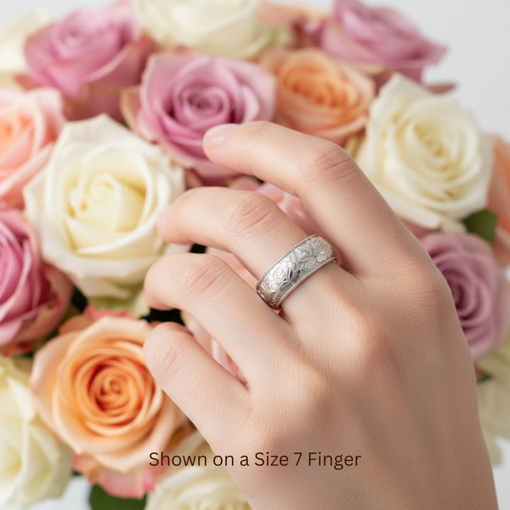 14K white gold rose wedding band worn on hand, engraved floral ring with roses | Rare Earth Jewelry