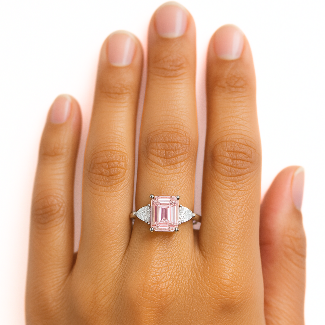 2 Carat Emerald Cut Morganite Ring on the Hand, Three Stone Morganite Engagement Ring with Trillions Hand Photo, Natural Pink Gemstone Engagement Ring  | Rare Earth Jewelry