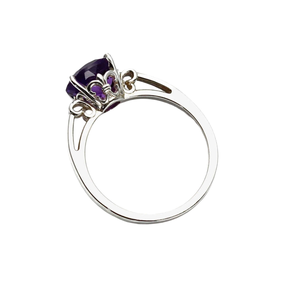 Side view of 14K Gold Amethyst Ring showing the New Orleans inspired Fleur De Lis design in the gallery.