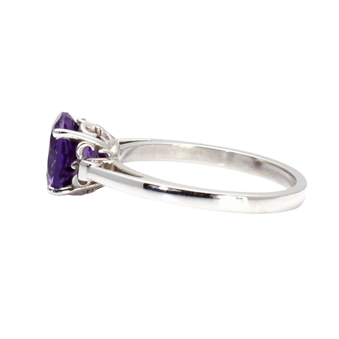 14K Gold Amethyst Ring with a Fleur de Lis Design Round Solitaire Setting, Side View