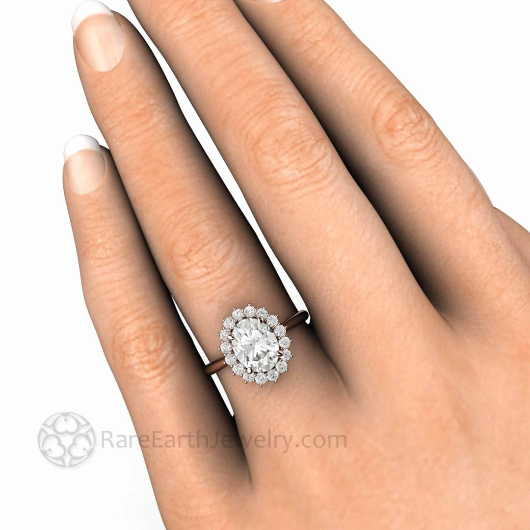 2ct Oval Moissanite Engagement Ring shown on the Hand, Heirloom-Style Halo Design with 9x7mm Forever One Moissanite