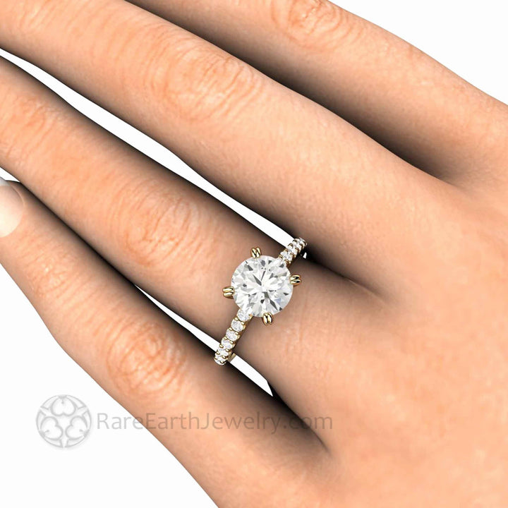 2ct Round Moissanite Solitaire Engagement Ring, Double Prong Cathedral Setting shown on the Hand