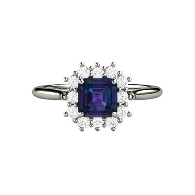 An Alexandrite engagement ring with diamonds in a unique vintage style design.  A 1 carat asscher cut lab created Alexandrite is surrounded by a halo of diamonds in 14K or 18K Gold or Platinum.