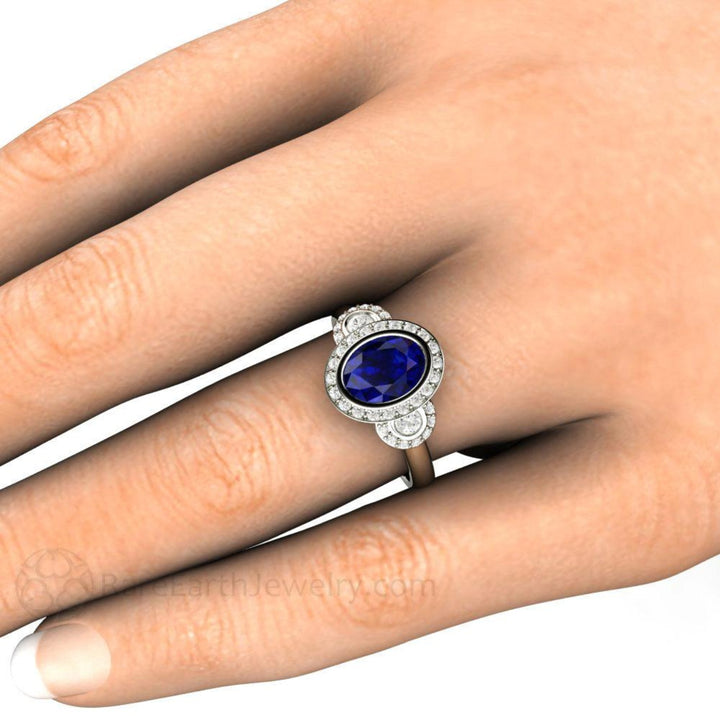 Antique Style Oval Blue Sapphire Engagement Ring on the Hand