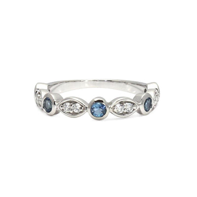 An Aquamarine band with diamonds and natural Aquamarine bezel set in a pretty March birthstone ring or Wedding ring.