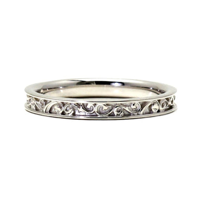 An Art Deco style wedding ring or band has a vintage design with filigree scroll pattern all of the way around in 14K, 18K Gold or Platinum.