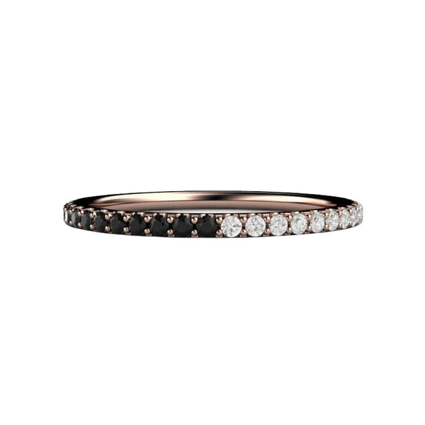 A diamond band with half black diamonds and half white diamonds in a dainty pave setting in gold or platinum, a unique wedding ring or anniversary band from Rare Earth Jewelry.