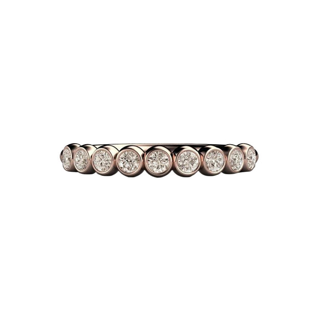 A light brown champagne diamond wedding ring or stackable band in a bezel set bubble band design, shown here in rose gold.
