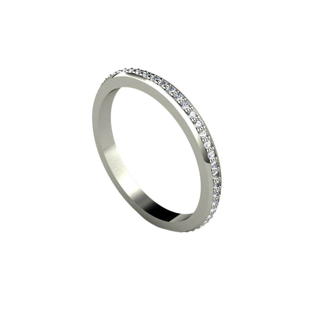 A classic diamond eternity band, wedding ring or anniversary band with natural diamonds all of the way around the band made in gold or platinum from Rare Earth Jewelry.