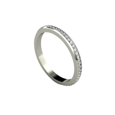 A classic diamond eternity band, wedding ring or anniversary band with natural diamonds all of the way around the band made in gold or platinum..