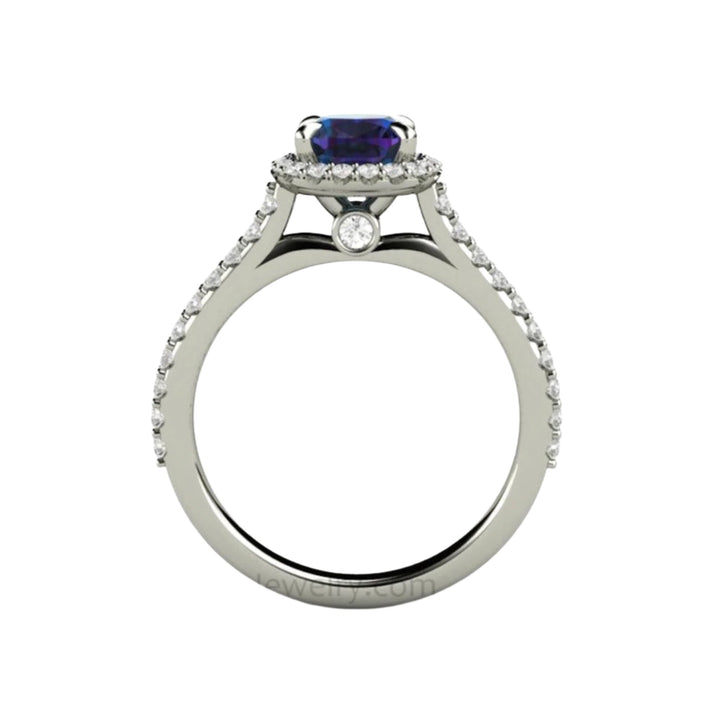 Cushion cut Alexandrite Engagement Ring viewed from the side profile displaying the pave set diamonds and hidden diamond in the gallery