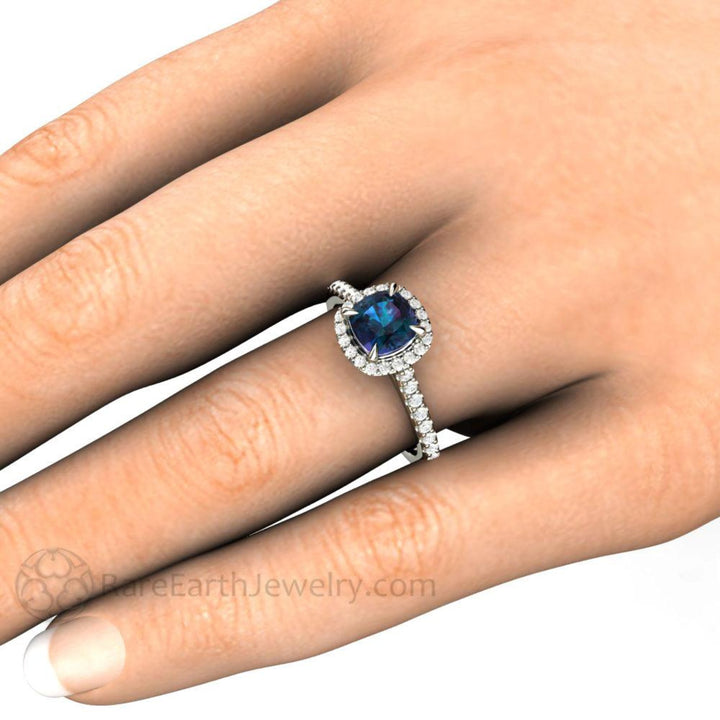 Alexandrite Engagement Ring | Cushion Cut Color Changing Gemstone with Diamond Halo in Gold or Platinum - Shown on the Hand