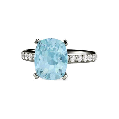 A large rectangular cushion cut natural Aquamarine engagement ring in a solitaire setting with diamond accents in gold or platinum.  March birthstone ring.