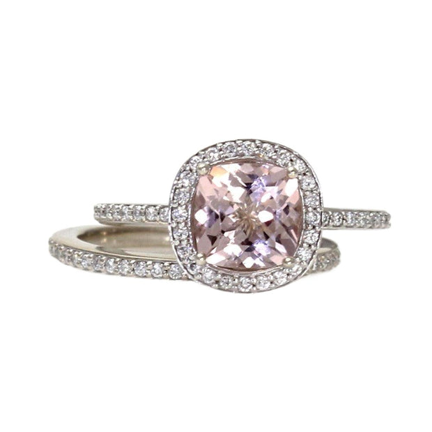A natural Pink Morganite cushion cut engagement ring with diamond halo and matching diamond wedding ring in gold or platinum.