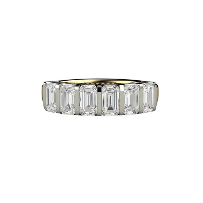 An emerald cut Moissanite band or wedding ring with a bar set bezel half eternity design in two-tone gold. This Moissanite ring has stones going half way around the band..