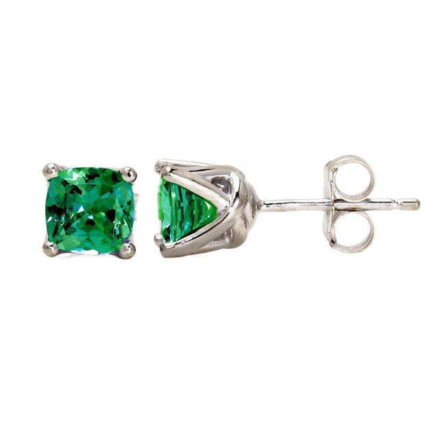 A pair of cushion cut emerald earrings in a woven prong stud setting in 14K Gold. May birthstone earrings.