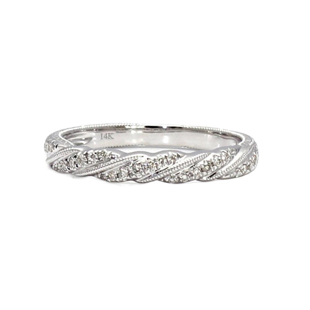 A vintage style diamond wedding band with an Art Deco inspired engraved design with twisted ropes of gold and milgrain from Rare Earth Jewelry.