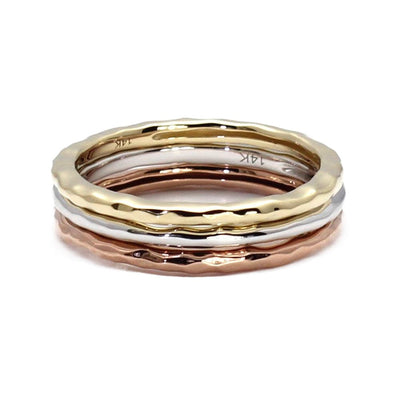 A 1.8mm thin band with a hammered finish wedding ring or stackable band available in 14K or 18K White Gold, Yellow Gold, Rose Gold and Platinum from Rare Earth Jewelry.