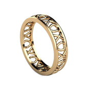 A 5mm band with an XOXO pattern representing hugs and kisses wedding ring, eternity band or stackable band in gold or platinum from Rare Earth Jewelry.
