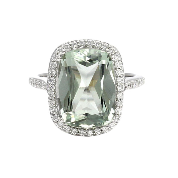 A large Green Amethyst ring, right hand ring or statement ring with a 6.5ct cushion cut pastel green Amethyst and diamond halo available in gold or platinum from Rare Earth Jewelry.