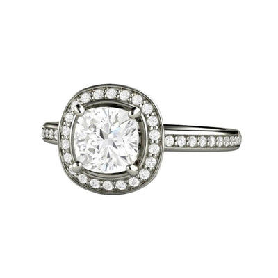 A 1 ct cushion cut Moissanite engagement ring in a classic halo design with Forever One Moissanite, an ethical and affordable lab created diamond alternative, available in gold or platinum from Rare Earth Jewelry.