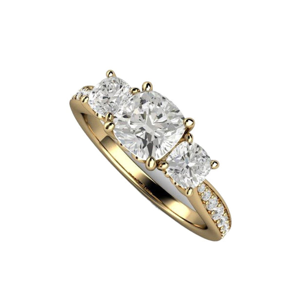 A 3 Stone Forever One Moissanite Cushion Cut Engagement Ring with accented band, shown in Yellow Gold from Rare Earth Jewelry.