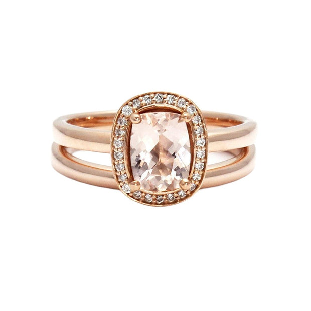 A rectangular cushion cut Morganite engagement ring with a diamond halo and matching plain rose gold band from Rare Earth Jewelry.
