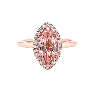 A Morganite marquise cut halo engagement ring, 1ct 10x5mm natural peach pink Morganite ring with a 6 prong halo setting on a plain band shown in rose gold from