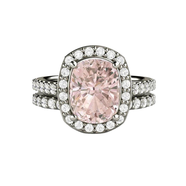 A large cushion cut natural Morganite engagement ring with a diamond halo, and the matching diamond wedding band. A peachy pink Morganite bridal set in gold or platinum.