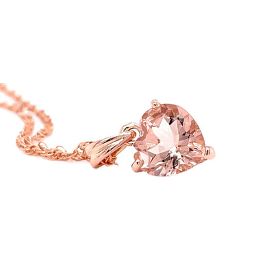 A natural Morganite necklace, a heart cut Morganite pendant a unique pastel peach pink gemstone in rose gold, perfect for a bride from Rare Earth Jewelry.