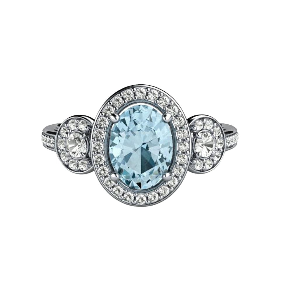 Oval Aquamarine Engagement Ring with Three-Stone Diamond Halo Setting, Natural Aquamarine and Diamond trio ring from Rare Earth Jewelry.