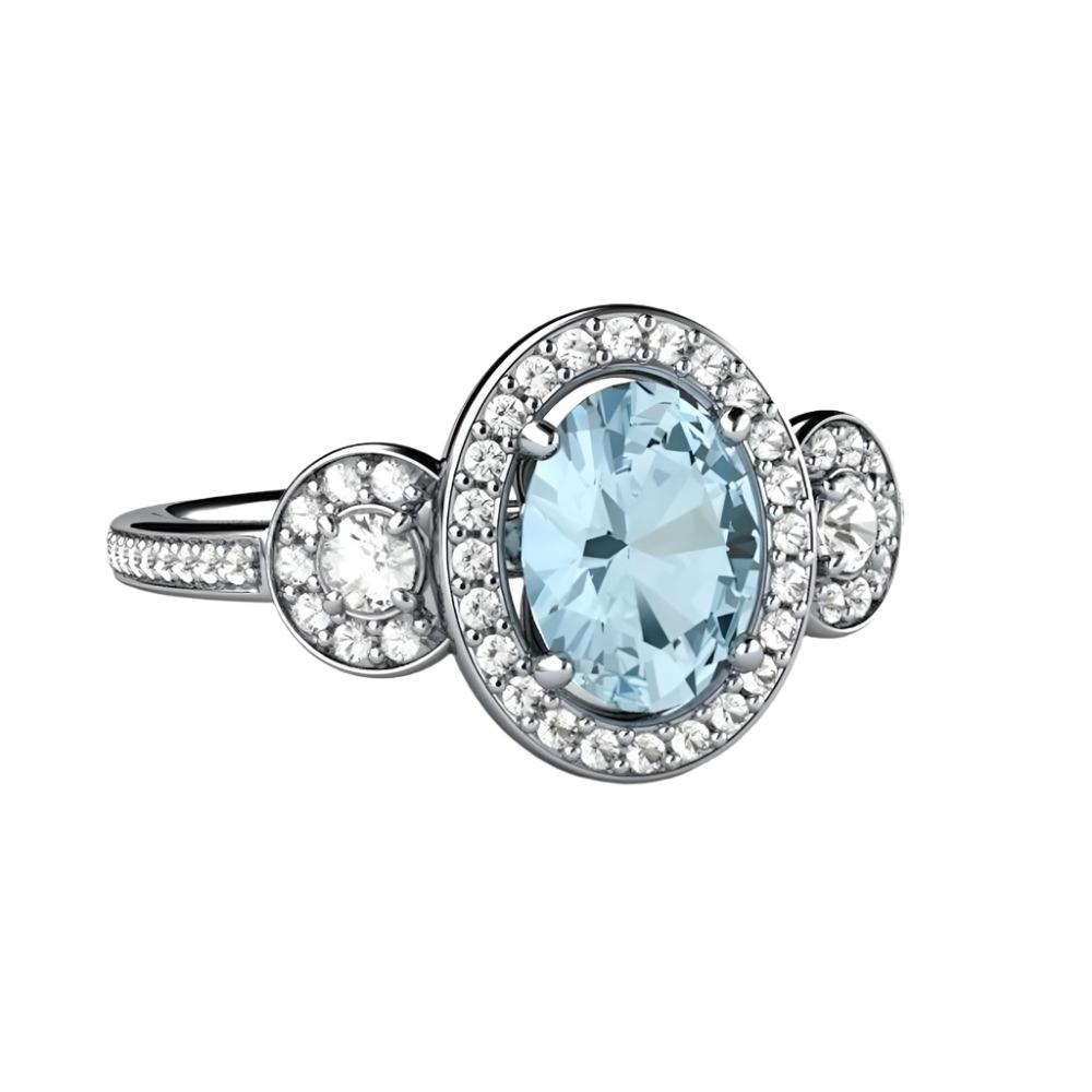 Oval Aquamarine Engagement Ring,  Three-Stone Diamond Halo Setting viewed from the side showing 3 Stone design and diamond accented band