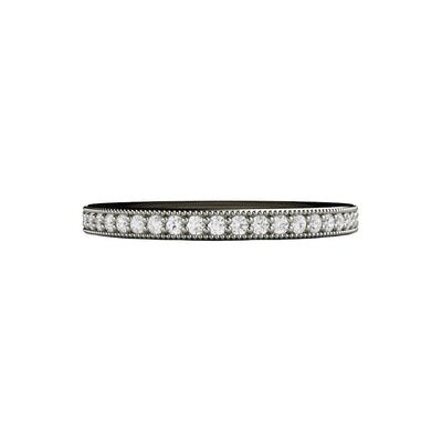 A vintage style diamond wedding ring or anniversary band with milgrain beaded edge details that pairs well with antique style engagement rings, available in gold or platinum from Rare Earth Jewelry.