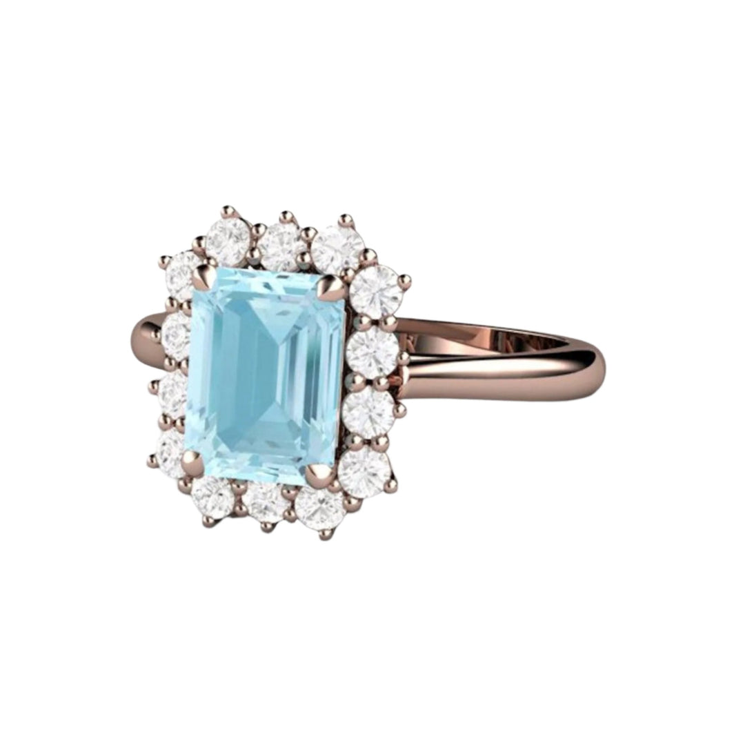 Vintage Style Emerald Cut Aquamarine Ring with Diamond Cluster Design in 14K Rose Gold