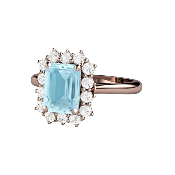 Vintage Style Emerald Cut Aquamarine Ring with Diamond Cluster Design in 14K Rose Gold