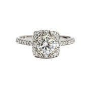 An Art Deco inspired Moissanite engagement ring with a vintage style diamond halo and a Charles & Colvard Forever One Moissanite, a brilliant eco-friendly and ethical lab created diamond alternative from Rare Earth Jewelry.