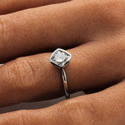 Bezel Set Cushion Cut Engagement Ring with Forever One Moissanite Simple Solitaire on the finger - Rare Earth Jewelry