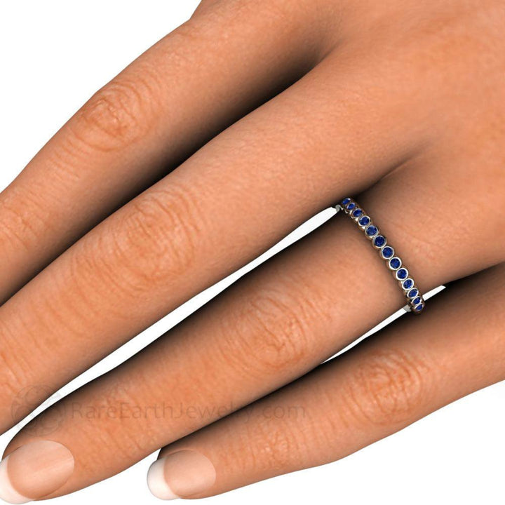 Blue Sapphire Bezel Set Stacking Ring Shown on the Hand, Bubble Style Sapphire Band, Great for Stacking | Rare Earth Jewelry