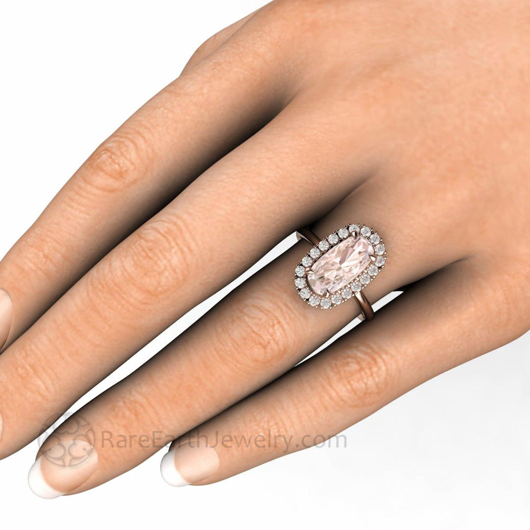 Elongated Cushion Cut Morganite Engagement Ring Diamond Halo and Claw Prongs on the Hand