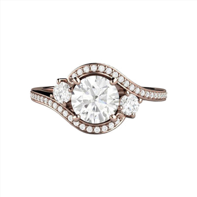 A round 1ct Forever One Moissanite Engagement Ring in a 3 Stone Style with Halo and Split Shank from Rare Earth Jewelry