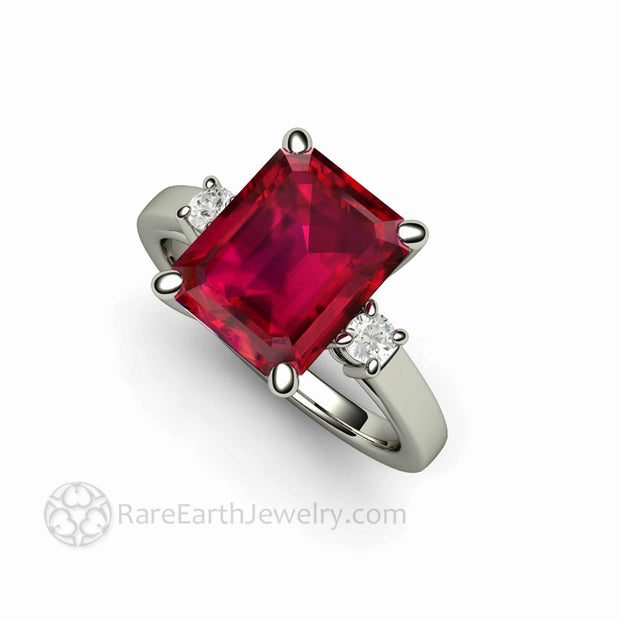 Large Emerald Cut Ruby Ring 3 Stone Design with Diamonds
