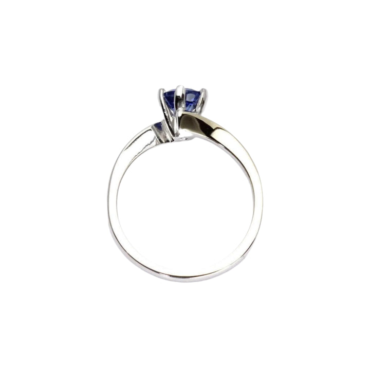 Side view of natural sapphire engagement ring showing 6-prong setting and bypass design | Rare Earth Jewelry