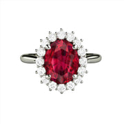 A Ruby Engagement Ring in a Vintage Style Diamond Cluster Design, Oval Ruby Ring with Diamonds in Gold or Platinum from Rare Earth Jewelry.