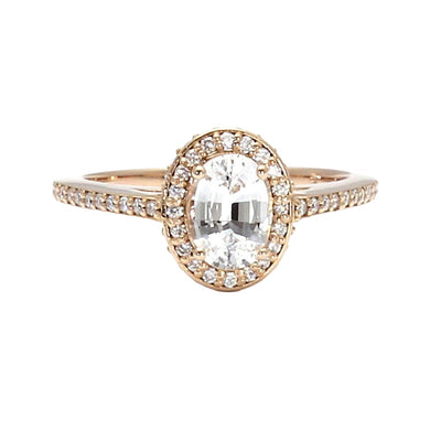 White Sapphire Oval Engagement Ring with a Cathedral Diamond Halo Design in Rose Gold from Rare Earth Jewelry