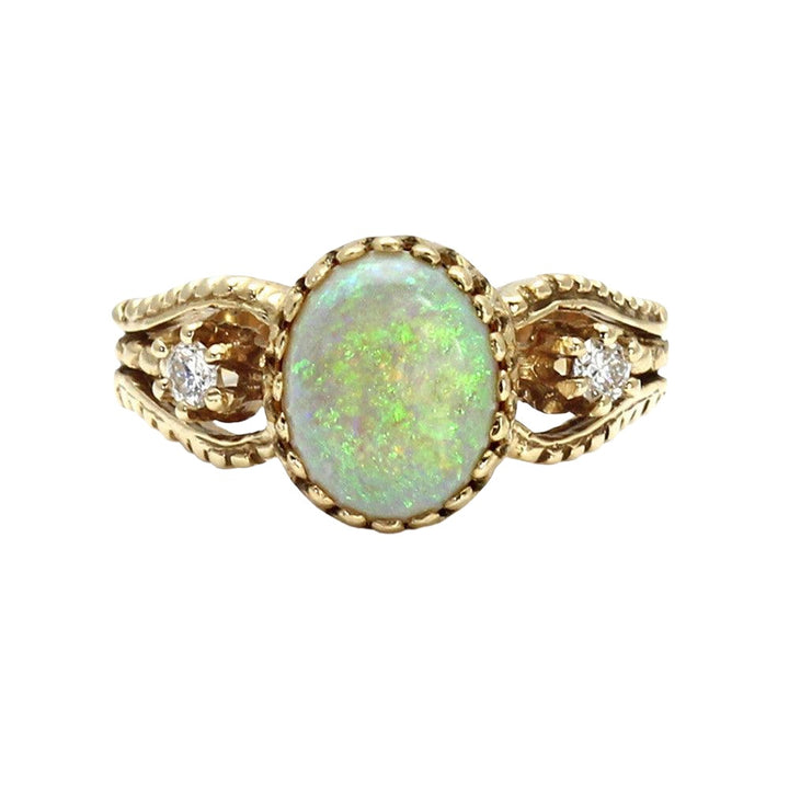 Vintage Inspired Opal Ring with Oval Natural White Opal Cabochon in a Gold Crown Design with Diamonds from Rare Earth Jewelry.