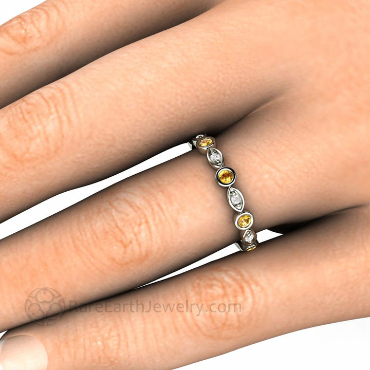 Yellow Sapphire Band with Diamond Accents shown on the Finger, Yellow Gemstone Ring, Wedding or Anniversary Band from Rare Earth Jewelry